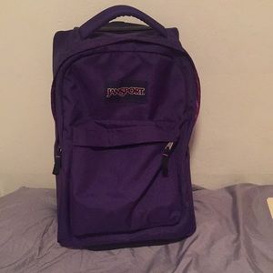 Jansport purple backpack with wheels